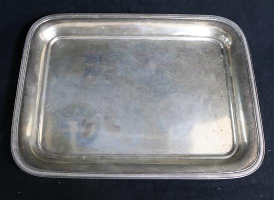 A Dutch 19th century silver (833) rectangular tray with gadroon border on bun feet